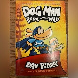 Hardcover Dog Man:  Brawl of the Wild Graphic Novel Book by Dav Pilkey